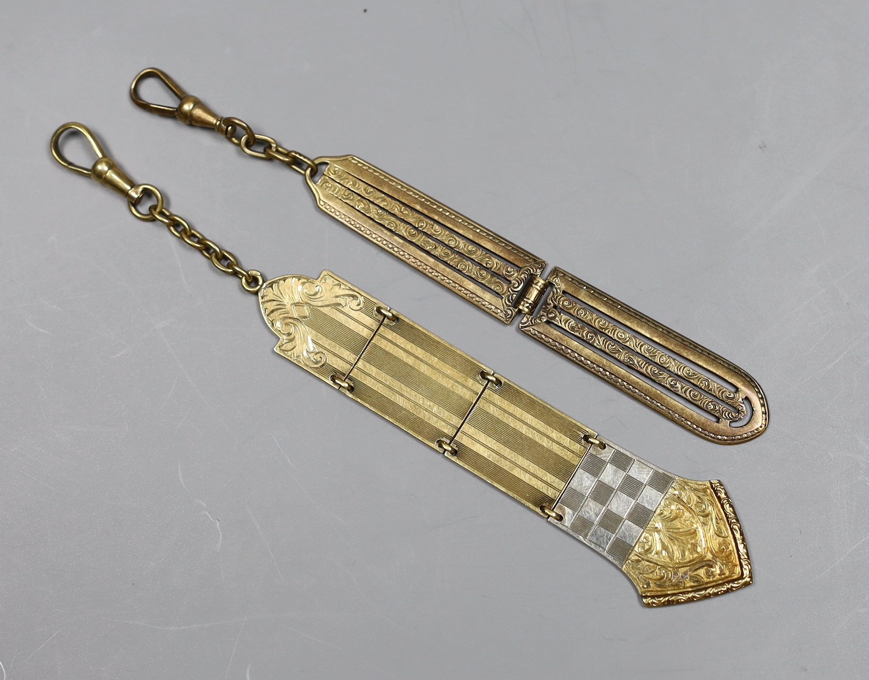 Two early 20th century Austro-Hungarian yellow metal chatelaine attachments?, approx. 85mm, one with Austro Hungarian 580 standard marks, the other stamped 14ct